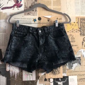 Levi’s distressed black acid wash cutoffs